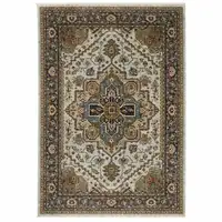 Photo of Ivory Beige Blue Orange Gold Green Grey And Rust Oriental Power Loom Stain Resistant Area Rug With Fringe