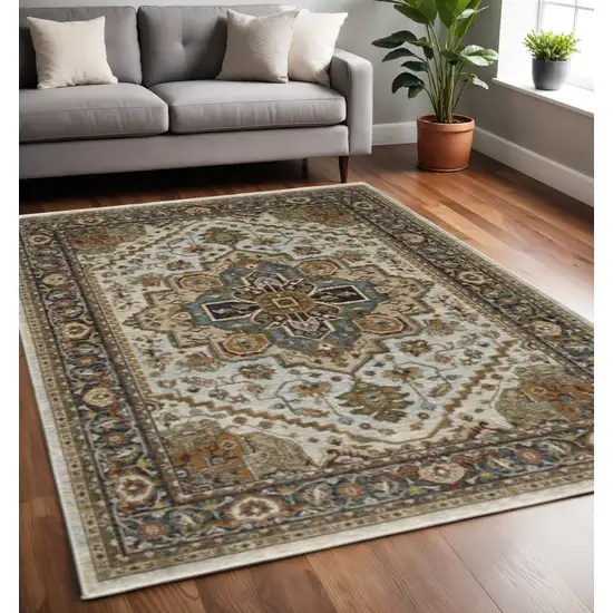 Ivory Beige Blue Orange Gold Green Grey And Rust Oriental Power Loom Stain Resistant Area Rug With Fringe Photo 1