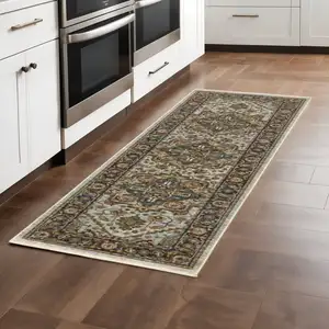 Photo of Ivory Beige Blue Orange Gold Green Grey And Rust Oriental Power Loom Stain Resistant Runner Rug With Fringe