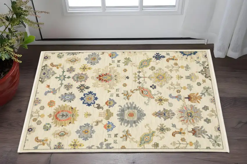 Ivory Beige Gold Grey Blue Pink Red Rust And Green Oriental Power Loom Stain Resistant Area Rug With Fringe Photo 1