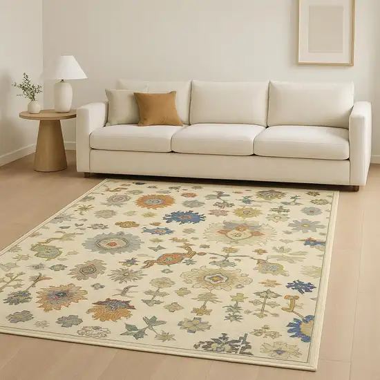 Ivory Beige Gold Grey Blue Pink Red Rust And Green Oriental Power Loom Stain Resistant Area Rug With Fringe Photo 1