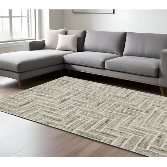 Ivory And Beige Geometric Area Rug Photo 1