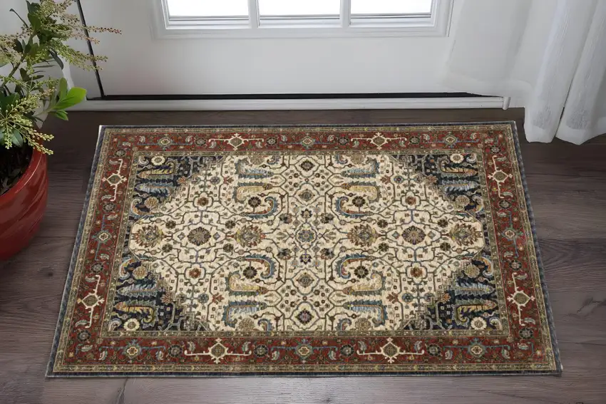 Ivory Beige Red Blue Gold Green And Navy Oriental Power Loom Stain Resistant Area Rug With Fringe Photo 1