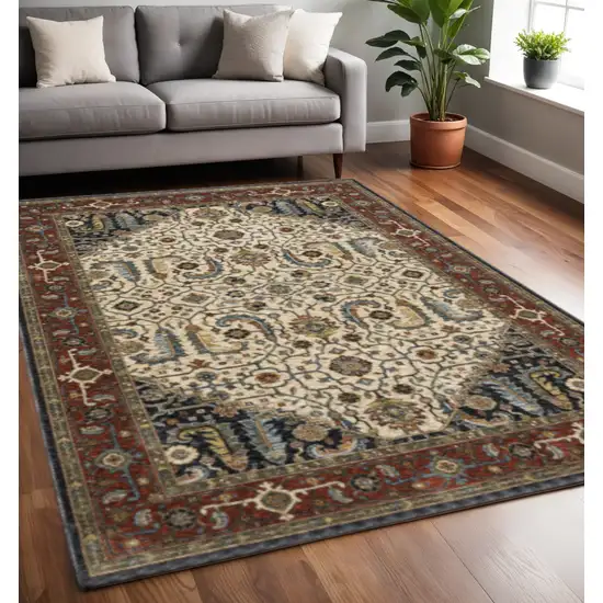 Ivory Beige Red Blue Gold Green And Navy Oriental Power Loom Stain Resistant Area Rug With Fringe Photo 1