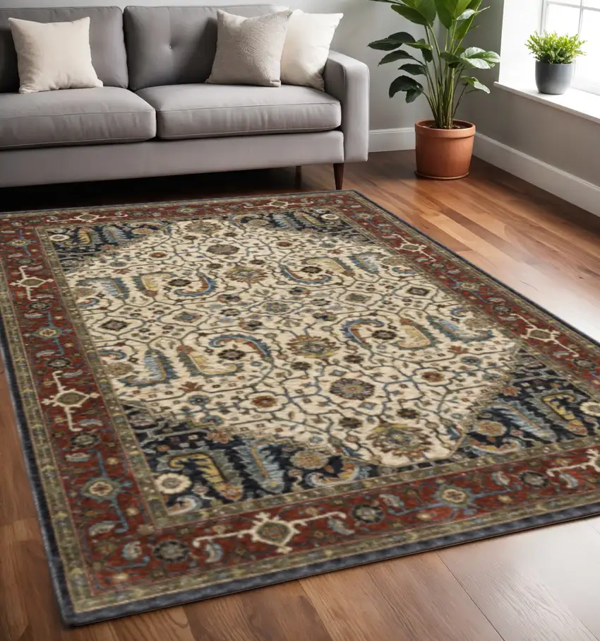 Ivory Beige Red Blue Gold Green And Navy Oriental Power Loom Stain Resistant Area Rug With Fringe Photo 1