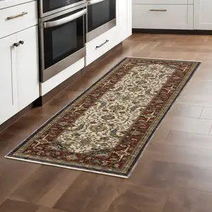 Photo of Ivory Beige Red Blue Gold Green And Navy Oriental Power Loom Stain Resistant Runner Rug With Fringe