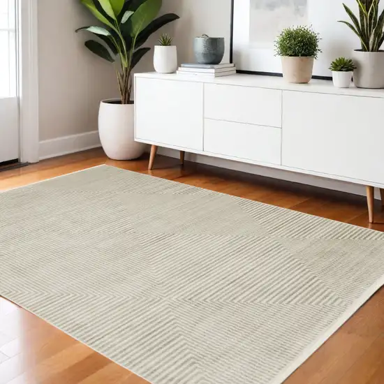 Ivory Beige Taupe And Tan Geometric Power Loom Stain Resistant Area Rug With Fringe Photo 1