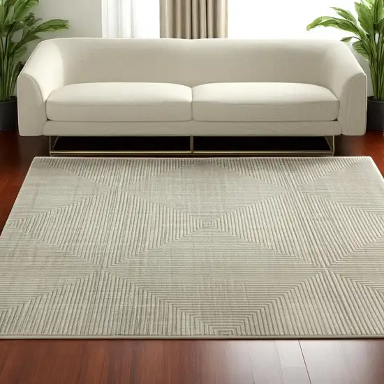 Ivory Beige Taupe And Tan Geometric Power Loom Stain Resistant Area Rug With Fringe Photo 1