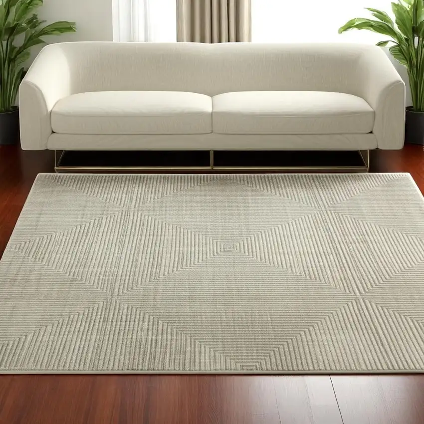 Ivory Beige Taupe And Tan Geometric Power Loom Stain Resistant Area Rug With Fringe Photo 1