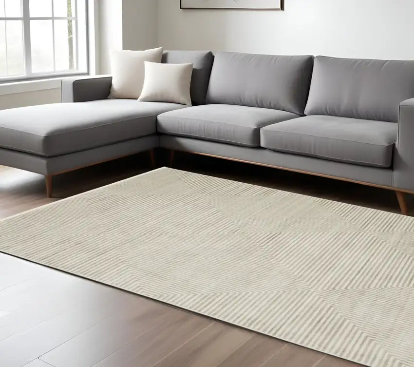Ivory Beige Taupe And Tan Geometric Power Loom Stain Resistant Area Rug With Fringe Photo 1