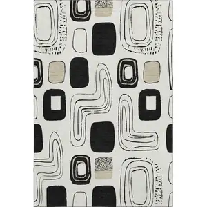 Photo of Ivory Black And Beige Geometric Washable Area Rug With UV Protection