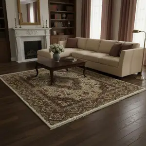 Photo of Ivory Black And Brown Medallion Area Rug With Fringe