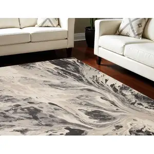 Photo of Ivory Black And Gray Abstract Area Rug