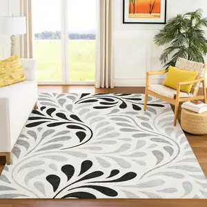 Photo of Ivory Black And Gray Botanical Leaves Washable Indoor Outdoor Area Rug
