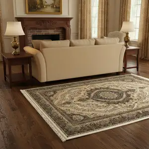 Photo of Ivory Black And Tan Medallion Area Rug With Fringe