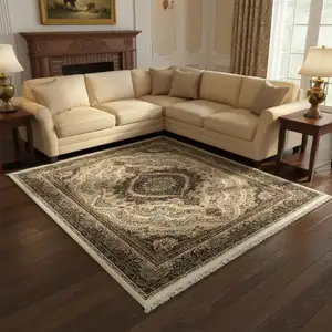 Photo of Ivory Black And Tan Medallion Area Rug With Fringe
