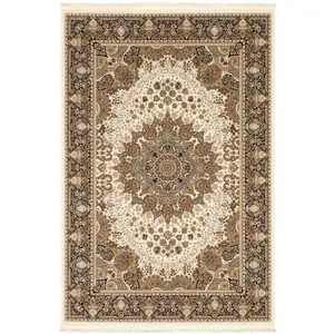 Photo of Ivory Black And Tan Medallion Area Rug With Fringe