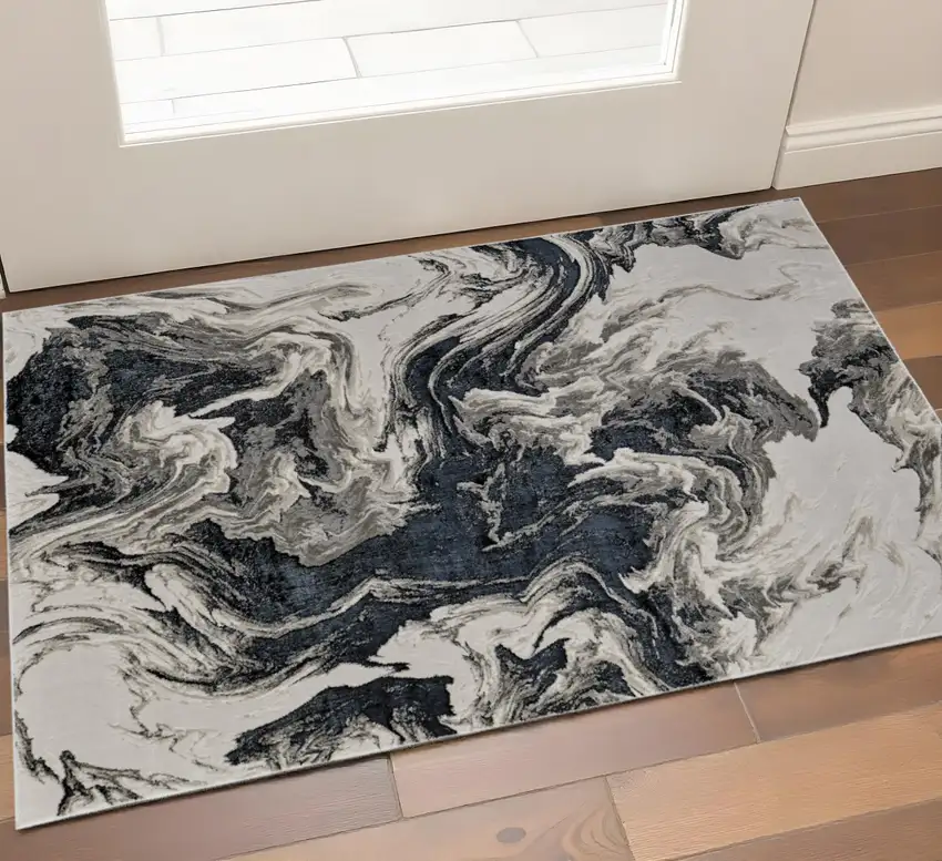 Ivory Black And Taupe Abstract Area Rug Photo 1