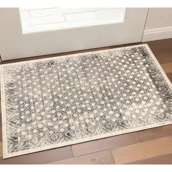 Ivory And Black Abstract Geometric Area Rug Photo 1