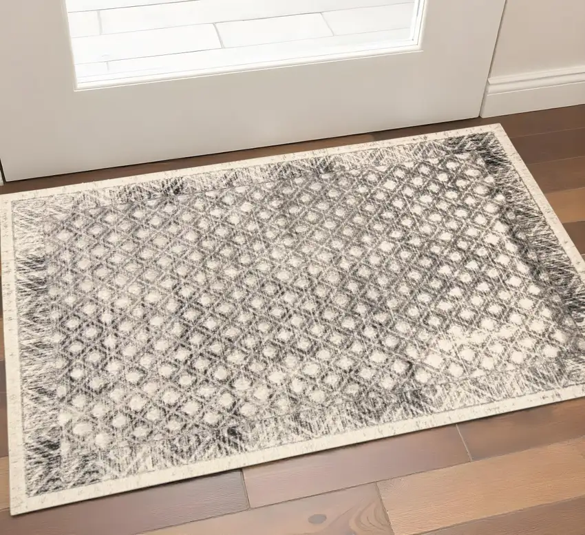 Ivory And Black Abstract Geometric Area Rug Photo 1