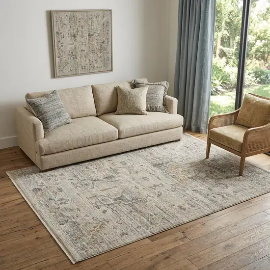 Ivory Black And Taupe Oriental Distressed Area Rug With Fringe Photo 1