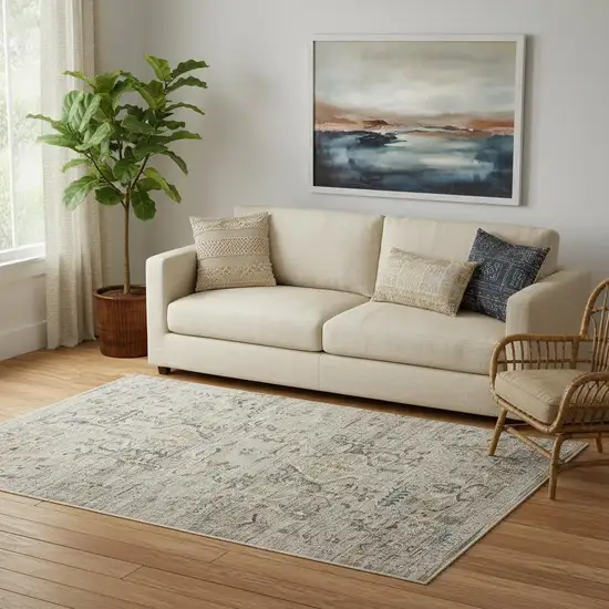 Ivory Black And Taupe Oriental Distressed Area Rug With Fringe Photo 1