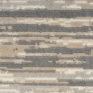 Photo of Ivory Black and Taupe Abstract Distressed Non Skid Area Rug