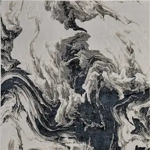 Photo of Ivory Black and Taupe Abstract Power Loom Area Rug