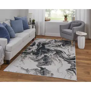 Photo of Ivory Black and Taupe Abstract Power Loom Area Rug