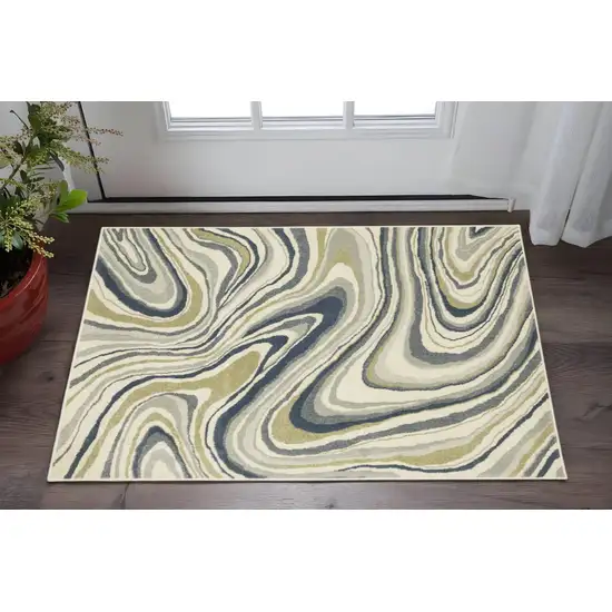 Ivory Blue And Beige Abstract Power Loom Stain Resistant Area Rug Photo 1