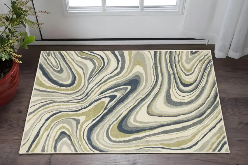 Ivory Blue And Beige Abstract Power Loom Stain Resistant Area Rug Photo 1