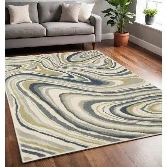 Ivory Blue And Beige Abstract Power Loom Stain Resistant Area Rug Photo 1