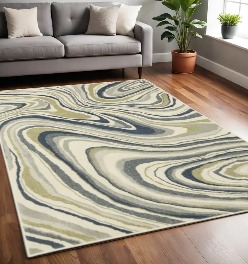 Ivory Blue And Beige Abstract Power Loom Stain Resistant Area Rug Photo 1