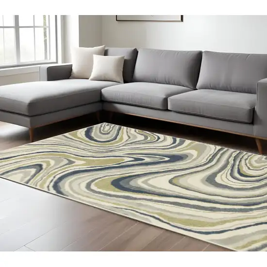 Ivory Blue And Beige Abstract Power Loom Stain Resistant Area Rug Photo 1