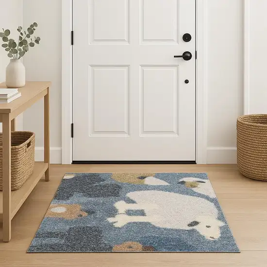 Ivory Blue And Beige Animal Print Area Rug Photo 1