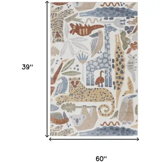 Ivory Blue And Beige Animal Print Area Rug Photo 3