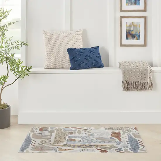 Ivory Blue And Beige Animal Print Area Rug Photo 4