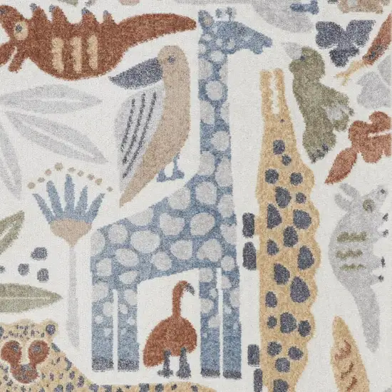 Ivory Blue And Beige Animal Print Area Rug Photo 4