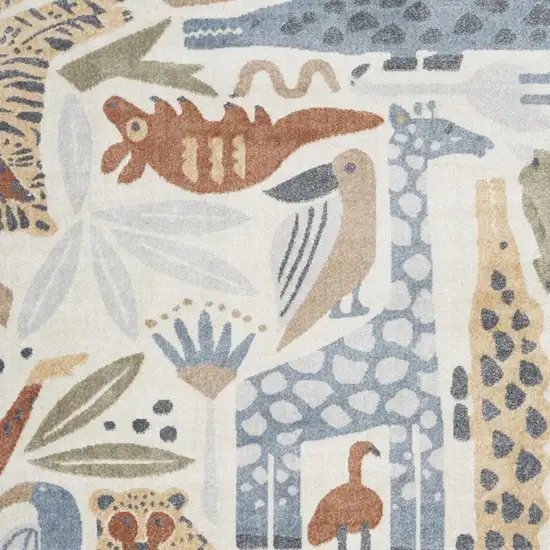 Ivory Blue And Beige Animal Print Area Rug Photo 5