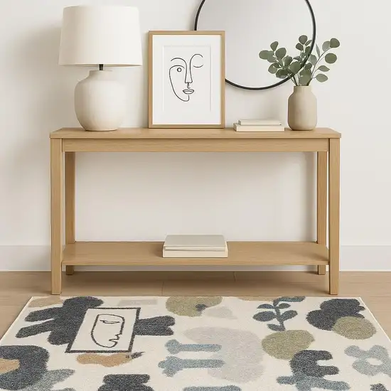 Ivory Blue And Beige Animal Print Area Rug Photo 1