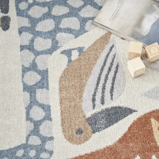 Ivory Blue And Beige Animal Print Area Rug Photo 9