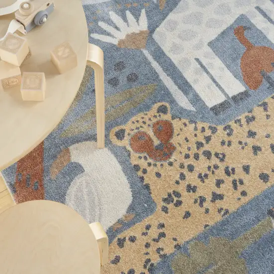 Ivory Blue And Beige Animal Print Area Rug Photo 9