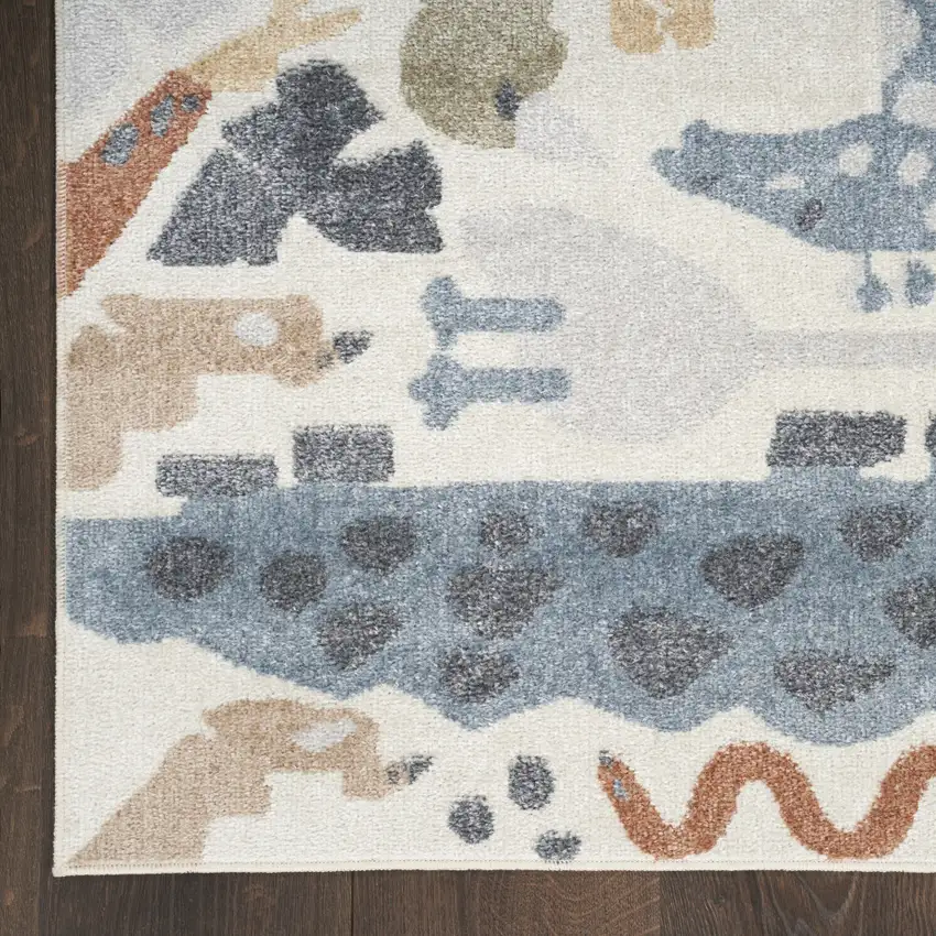 Ivory Blue And Beige Animal Print Area Rug Photo 7