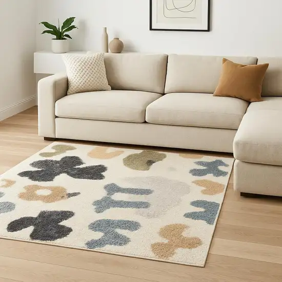 Ivory Blue And Beige Animal Print Area Rug Photo 1