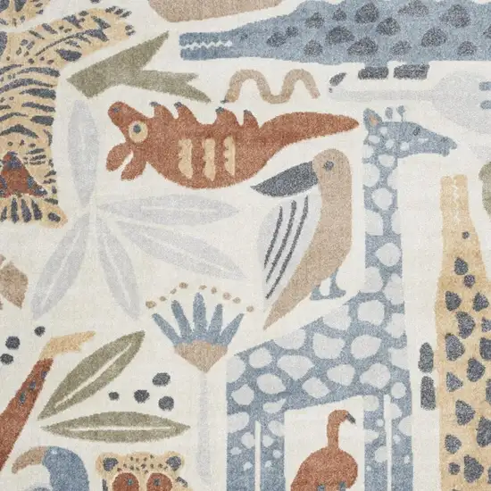 Ivory Blue And Beige Animal Print Area Rug Photo 4