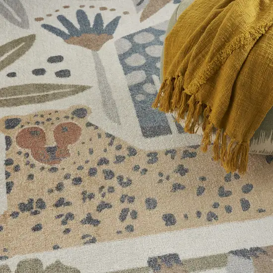 Ivory Blue And Beige Animal Print Area Rug Photo 9