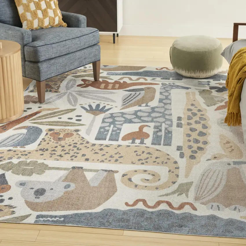 Ivory Blue And Beige Animal Print Area Rug Photo 4