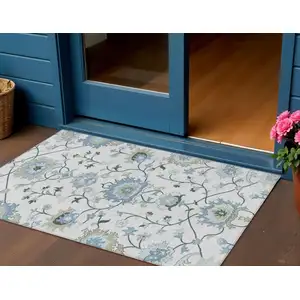 Photo of Ivory Blue And Beige Floral Washable Indoor Outdoor Area Rug