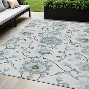 Photo of Ivory Blue And Beige Floral Washable Indoor Outdoor Area Rug