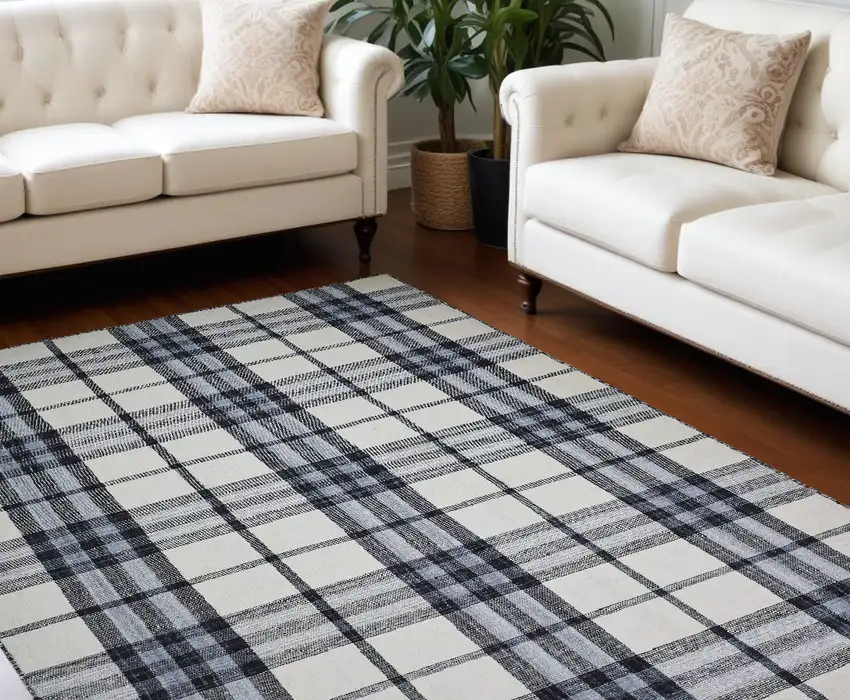 Ivory Blue And Black Abstract Hand Woven Stain Resistant Area Rug Photo 1